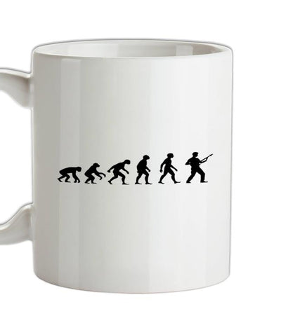 Evolution of Man Bass Guitar Player Ceramic Mug
