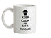 Keep Calm and Eat A Cupcake Ceramic Mug