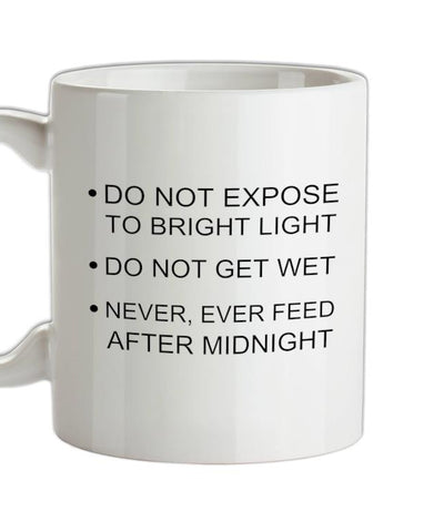 Never, Ever Feed After Midnight Ceramic Mug