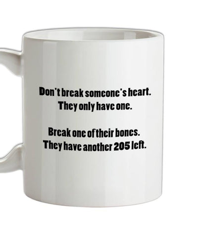 Don't break hearts, break bones Ceramic Mug