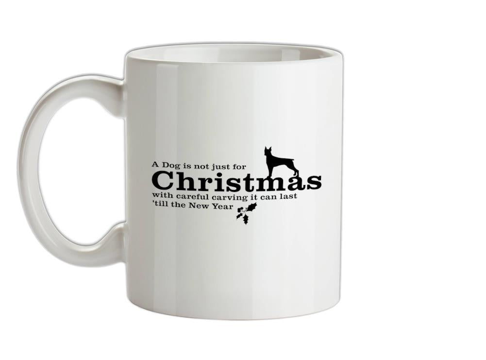 A dog is not just for christmas, with careful carving it can last 'till the new year Ceramic Mug