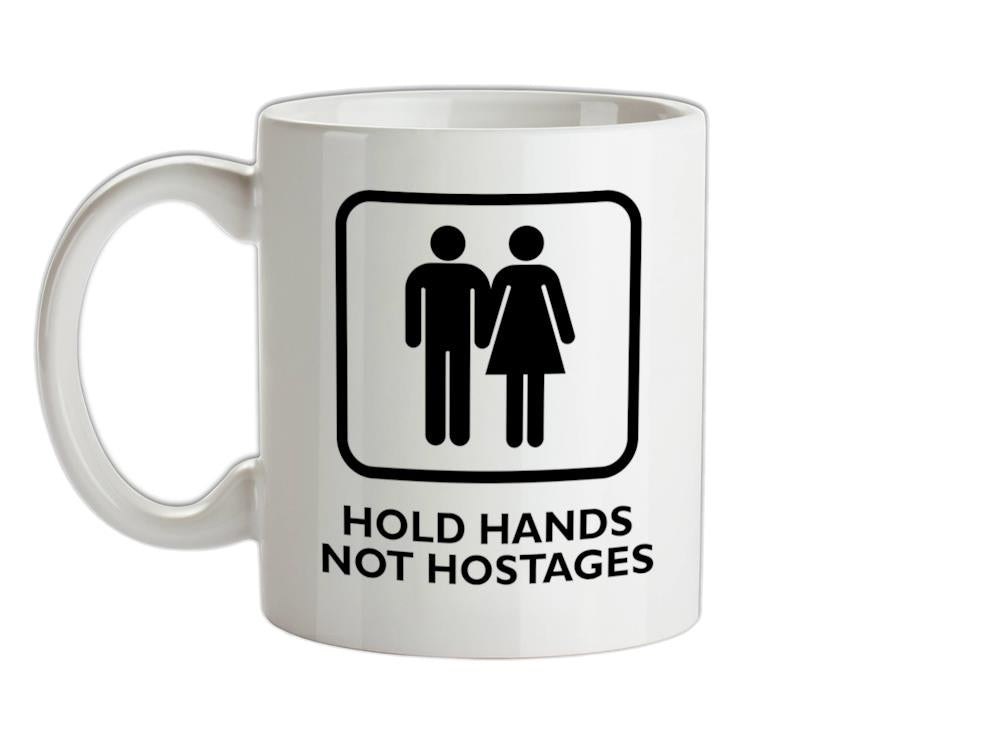 Hold Hands, Not Hostages Ceramic Mug