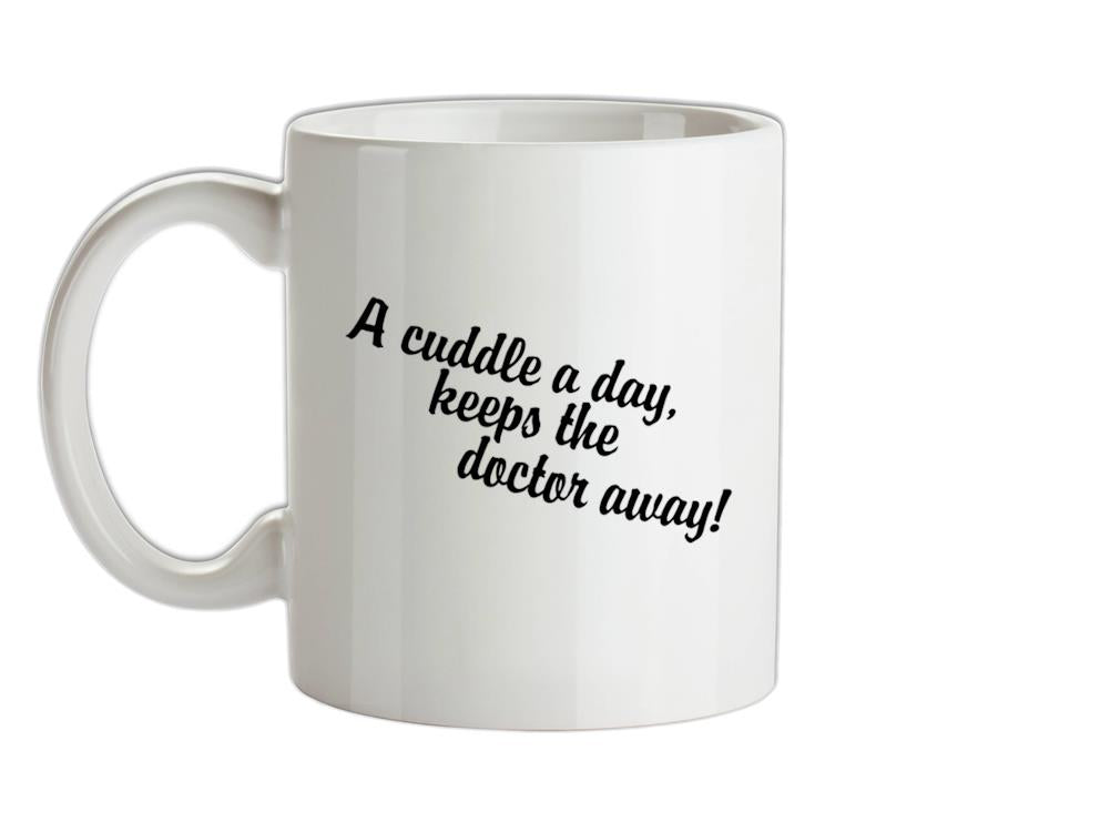 A cuddle a day keeps the doctor away Ceramic Mug